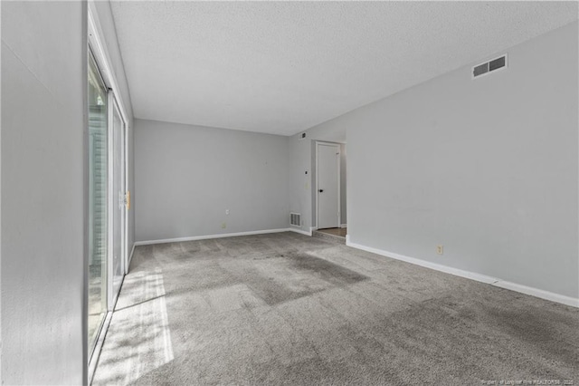 595 Winding Creek Rd Unit C, Fayetteville, NC 28305 - unfurnished room featuring a textured ceiling, carpet flooring, and baseboards