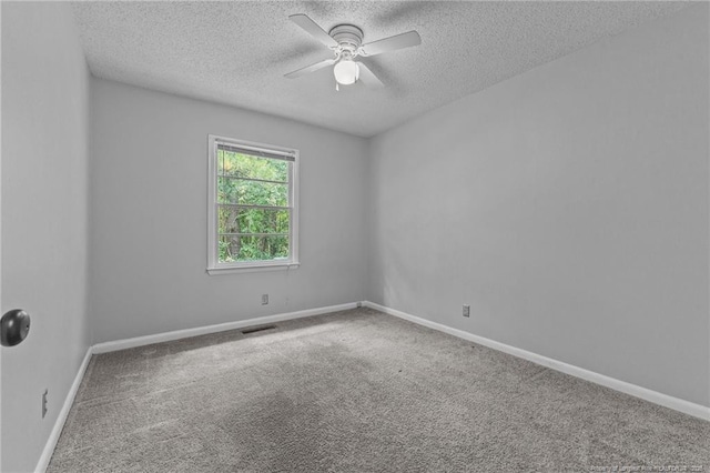 595 Winding Creek Rd Unit C, Fayetteville, NC 28305 - unfurnished room featuring a textured ceiling, carpet, a ceiling fan, and baseboards