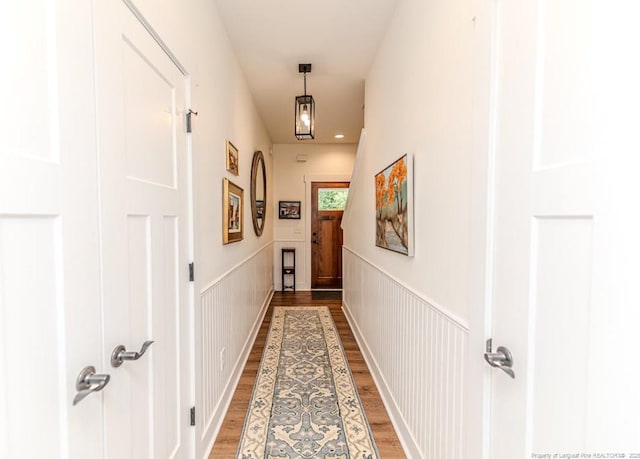 460 Clark St, Southern Pines, NC 28387 - corridor with light wood finished floors and wainscoting
