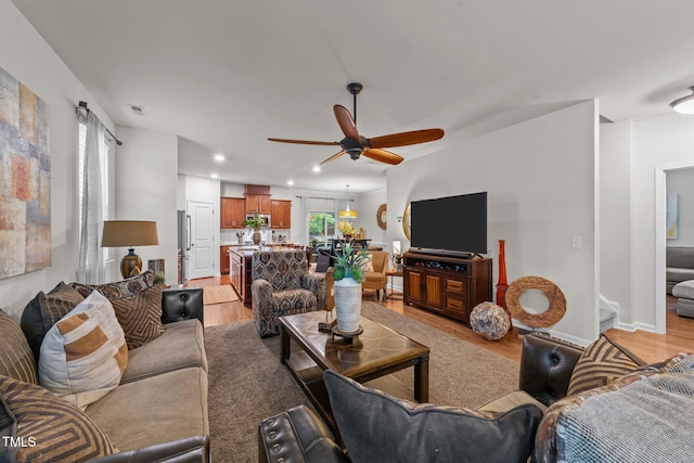 8132 Wheeler Woods Dr, Apex, NC 27539 - living room featuring a ceiling fan, light wood finished floors, recessed lighting, and baseboards