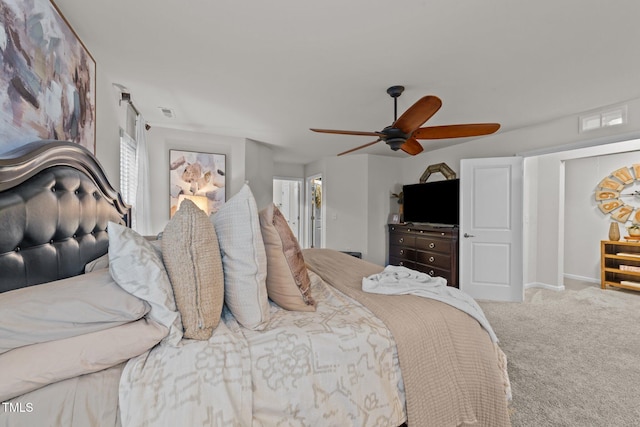 8132 Wheeler Woods Dr, Apex, NC 27539 - carpeted bedroom with a ceiling fan and baseboards
