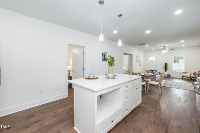 1318 N Alston Ave, Durham, NC 27701 - kitchen featuring open floor plan, recessed lighting, a ceiling fan, a kitchen island, and white cabinets