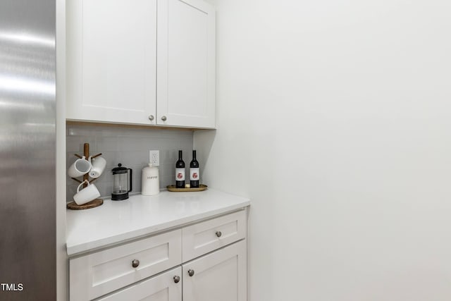 1318 N Alston Ave, Durham, NC 27701 - bar area featuring decorative backsplash and freestanding refrigerator