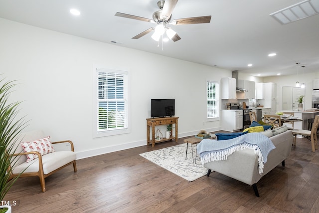 1318 N Alston Ave, Durham, NC 27701 - living room with baseboards, recessed lighting, dark wood-type flooring, and a ceiling fan