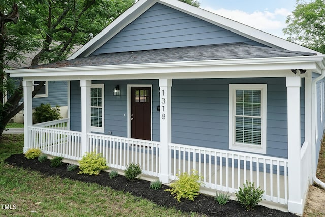 1318 N Alston Ave, Durham, NC 27701 - view of front facade featuring a porch and roof with shingles