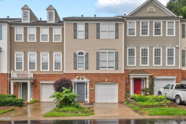 5505 Heather Garden Way, Raleigh, NC 27613 - view of property featuring brick siding, driveway, and an attached garage