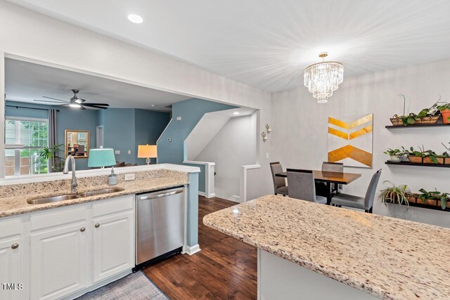 5505 Heather Garden Way, Raleigh, NC 27613 - kitchen with dishwasher, dark wood-style floors, white cabinetry, light stone counters, and a ceiling fan