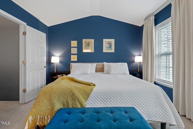 5505 Heather Garden Way, Raleigh, NC 27613 - bedroom featuring carpet flooring, multiple windows, and lofted ceiling