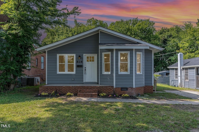 828 Cotton Pl, Raleigh, NC 27601 - view of front of house featuring a lawn and cooling unit