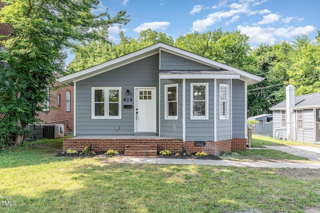 828 Cotton Pl, Raleigh, NC 27601 - bungalow-style home with a front lawn and central AC unit