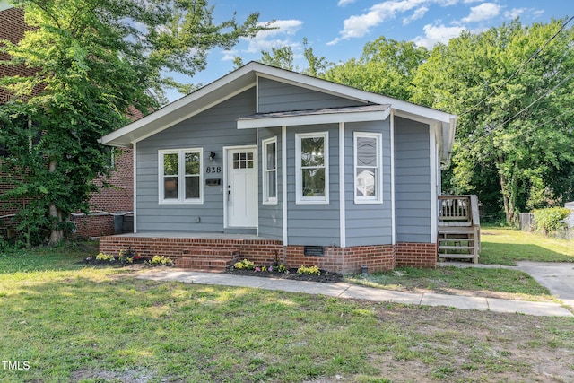 828 Cotton Pl, Raleigh, NC 27601 - bungalow-style house featuring a front lawn