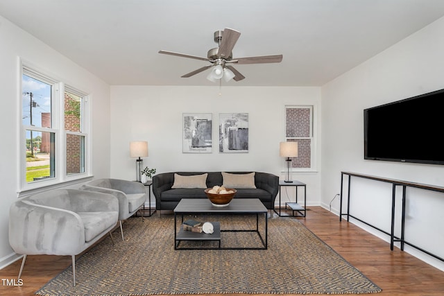 828 Cotton Pl, Raleigh, NC 27601 - living area with wood finished floors, ceiling fan, and baseboards