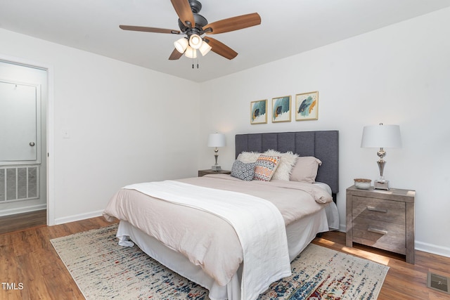 828 Cotton Pl, Raleigh, NC 27601 - bedroom with wood finished floors, baseboards, and a ceiling fan