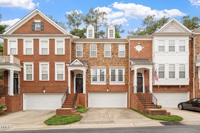 2614 Laurelcherry St, Raleigh, NC 27612 - view of property featuring an attached garage, brick siding, and driveway