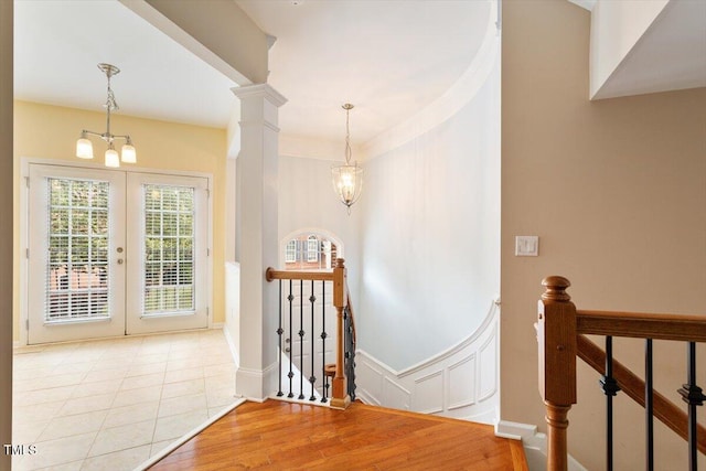 2614 Laurelcherry St, Raleigh, NC 27612 - foyer with a chandelier, french doors, and wood finished floors