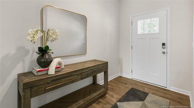 262 Hartfield Ave, Raeford, NC 28376 - entryway with wood finished floors and baseboards