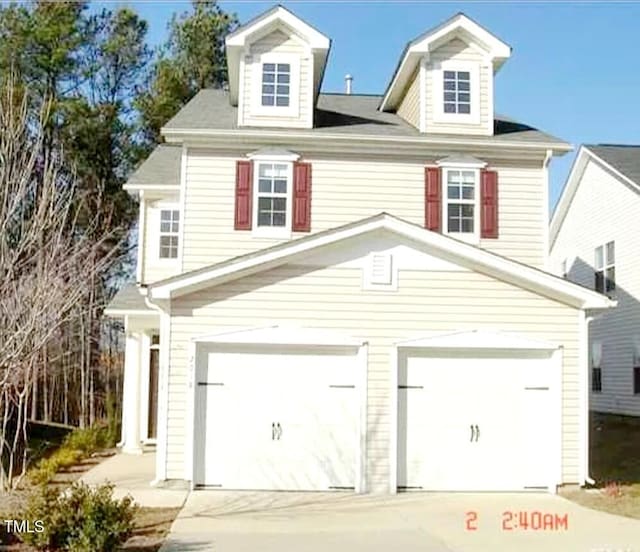2018 Remington Oaks Cir, Cary, NC 27519 - view of front of home with driveway and an attached garage