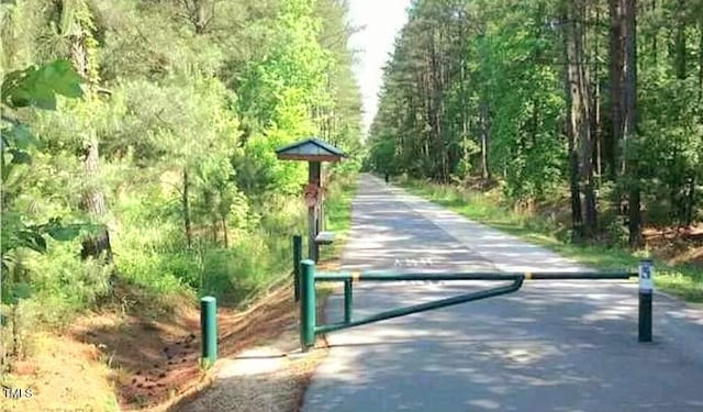 2018 Remington Oaks Cir, Cary, NC 27519 - view of home's community featuring a wooded view
