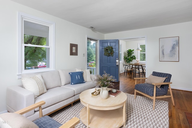2523 Glendale Ave, Durham, NC 27704 - living area with plenty of natural light, wood finished floors, and baseboards