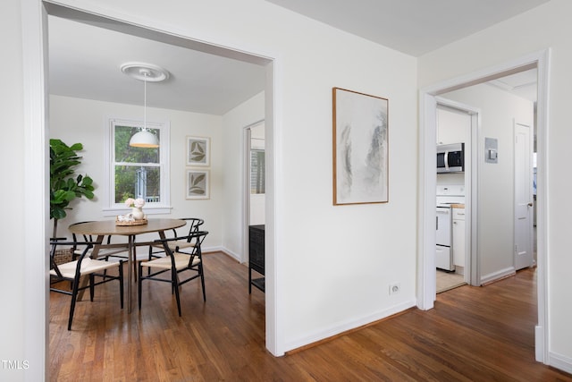 2523 Glendale Ave, Durham, NC 27704 - dining area with dark wood-style flooring and baseboards