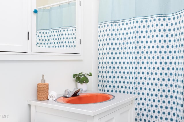 2523 Glendale Ave, Durham, NC 27704 - bathroom with vanity and curtained shower