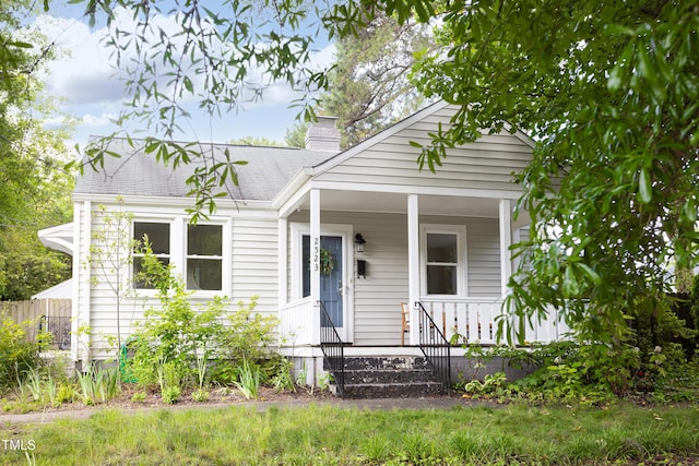 2523 Glendale Ave, Durham, NC 27704 - view of front of home with a chimney and covered porch
