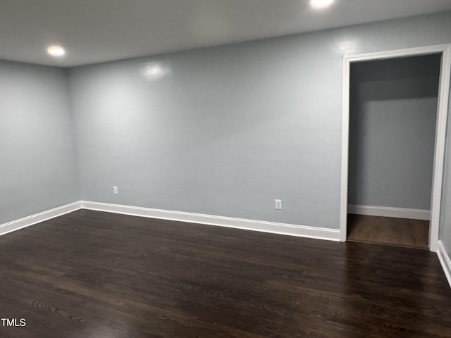 403 Oak St, Roanoke Rapids, NC 27870 - unfurnished room featuring dark wood finished floors, recessed lighting, and baseboards