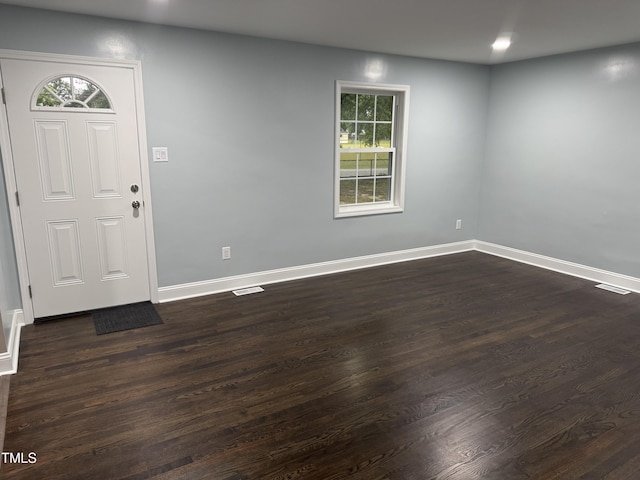 403 Oak St, Roanoke Rapids, NC 27870 - foyer featuring dark wood-style flooring and baseboards