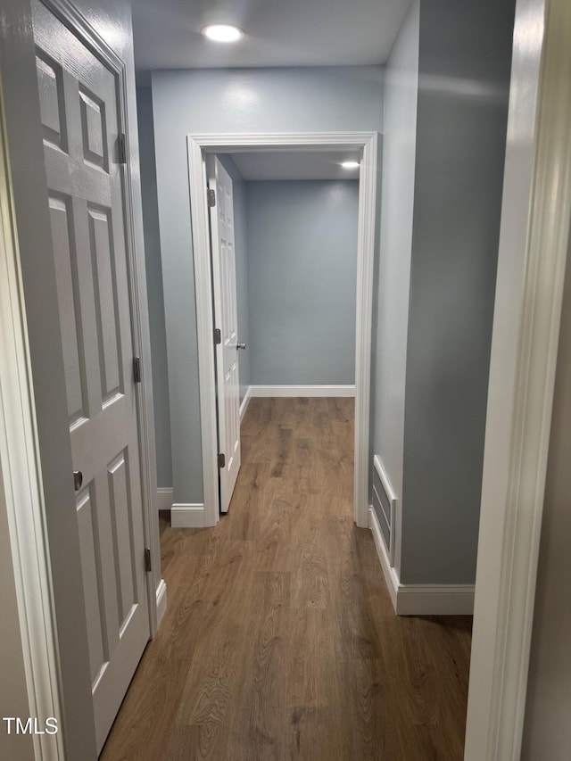 403 Oak St, Roanoke Rapids, NC 27870 - hallway with wood finished floors and baseboards