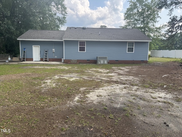 403 Oak St, Roanoke Rapids, NC 27870 - rear view of property featuring crawl space, central air condition unit, roof with shingles, a patio, and dirt driveway