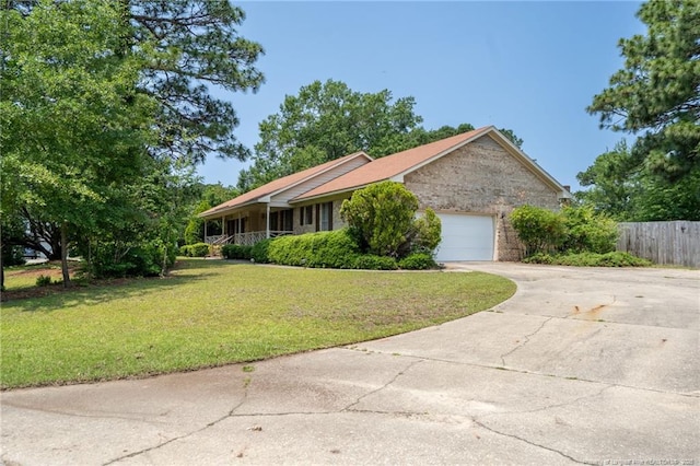 1608 Piney Creek Pl, Fayetteville, NC 28304 - ranch-style house with an attached garage and driveway