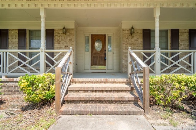 1608 Piney Creek Pl, Fayetteville, NC 28304 - property entrance featuring covered porch and brick siding