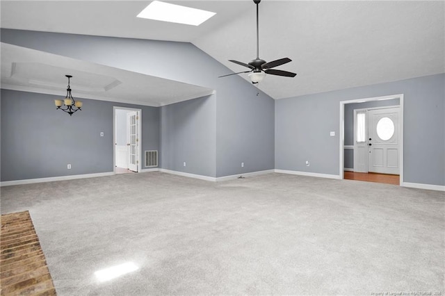1608 Piney Creek Pl, Fayetteville, NC 28304 - unfurnished living room with carpet flooring, ceiling fan, a chandelier, vaulted ceiling, and baseboards