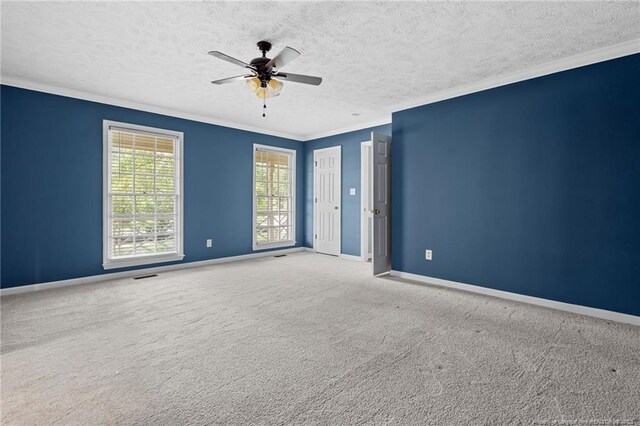 1608 Piney Creek Pl, Fayetteville, NC 28304 - carpeted empty room featuring ornamental molding, baseboards, a textured ceiling, and ceiling fan