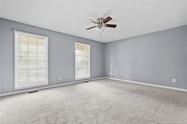 1608 Piney Creek Pl, Fayetteville, NC 28304 - empty room with ceiling fan, baseboards, and carpet flooring