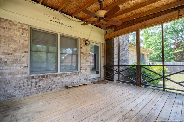 1608 Piney Creek Pl, Fayetteville, NC 28304 - unfurnished sunroom featuring a ceiling fan and beam ceiling