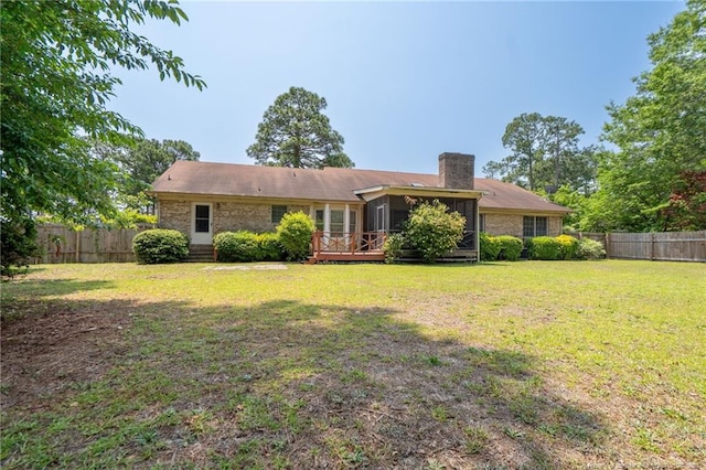 1608 Piney Creek Pl, Fayetteville, NC 28304 - back of house featuring a sunroom and a chimney