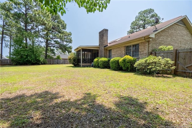 1608 Piney Creek Pl, Fayetteville, NC 28304 - view of yard with a sunroom