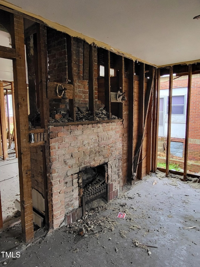 431 Charles St, Henderson, NC 27536 - unfurnished living room featuring a fireplace