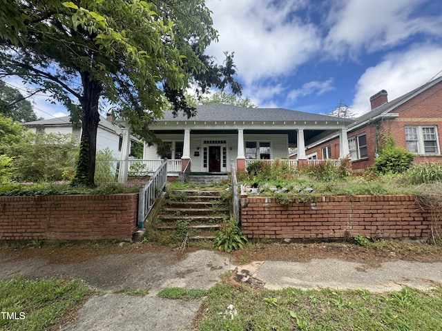 431 Charles St, Henderson, NC 27536 - view of front facade featuring covered porch and stairs