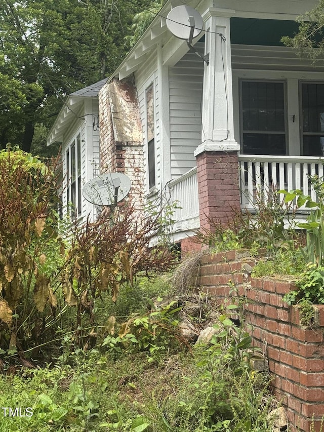 431 Charles St, Henderson, NC 27536 - view of side of home with covered porch