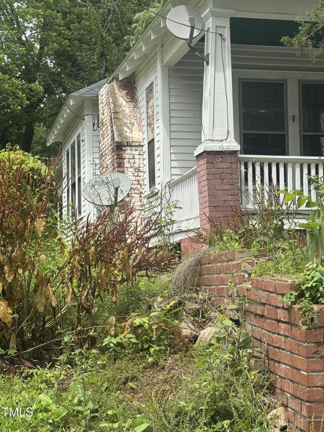 431 Charles St, Henderson, NC 27536 - view of side of home with covered porch