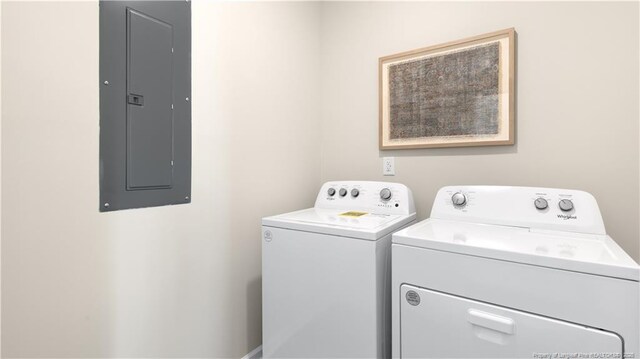 311 Hartfield Ave, Raeford, NC 28376 - laundry room featuring washer and dryer and electric panel