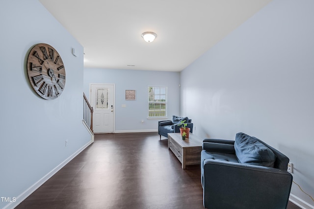 6729 Osprey Landing Dr, Wendell, NC 27591 - living area with stairway, dark wood-type flooring, and baseboards