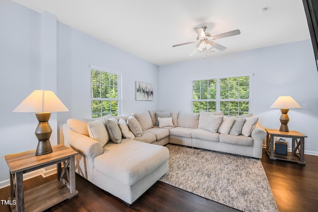 6729 Osprey Landing Dr, Wendell, NC 27591 - living area with a ceiling fan, dark wood-style floors, and baseboards