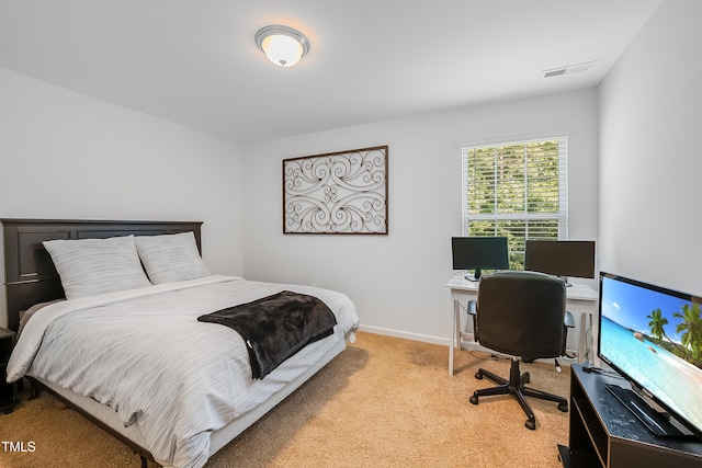 6729 Osprey Landing Dr, Wendell, NC 27591 - bedroom with light carpet, an office area, and baseboards
