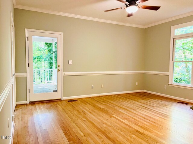 1512 Cumberland Rd, Chapel Hill, NC 27514 - spare room featuring light wood-style floors, a ceiling fan, crown molding, and baseboards