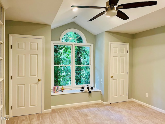 1512 Cumberland Rd, Chapel Hill, NC 27514 - unfurnished bedroom with light colored carpet, vaulted ceiling, baseboards, and a ceiling fan