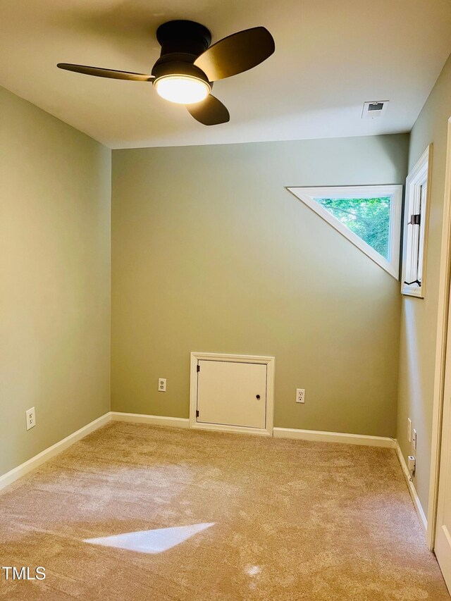 1512 Cumberland Rd, Chapel Hill, NC 27514 - carpeted spare room with a ceiling fan and baseboards