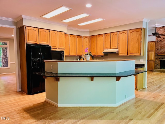 1512 Cumberland Rd, Chapel Hill, NC 27514 - kitchen featuring black appliances, under cabinet range hood, light wood-type flooring, crown molding, and recessed lighting